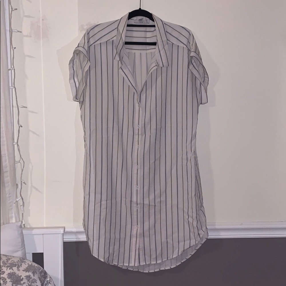 White dress with blue and yellow stripes